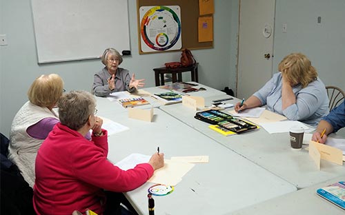 Teaching Artist Judith Becker teaches color theory at the Berkeley Art Works in Martinsburg